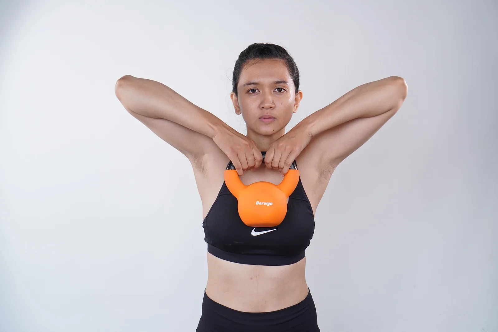 Woman holding kettlebell